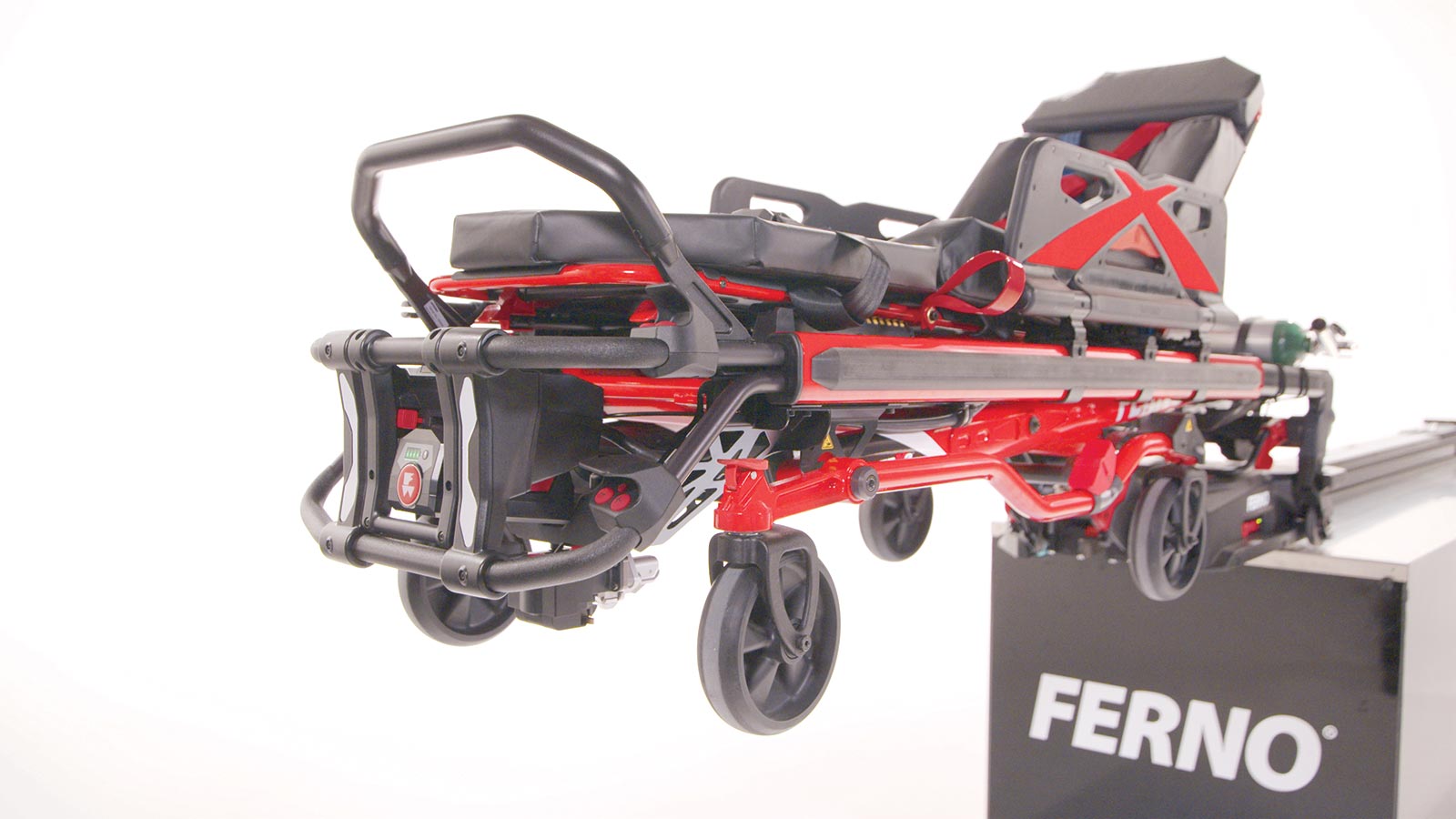 The Ferno Power X2 being lifted by the Ferno Power F2 loading system with power drive