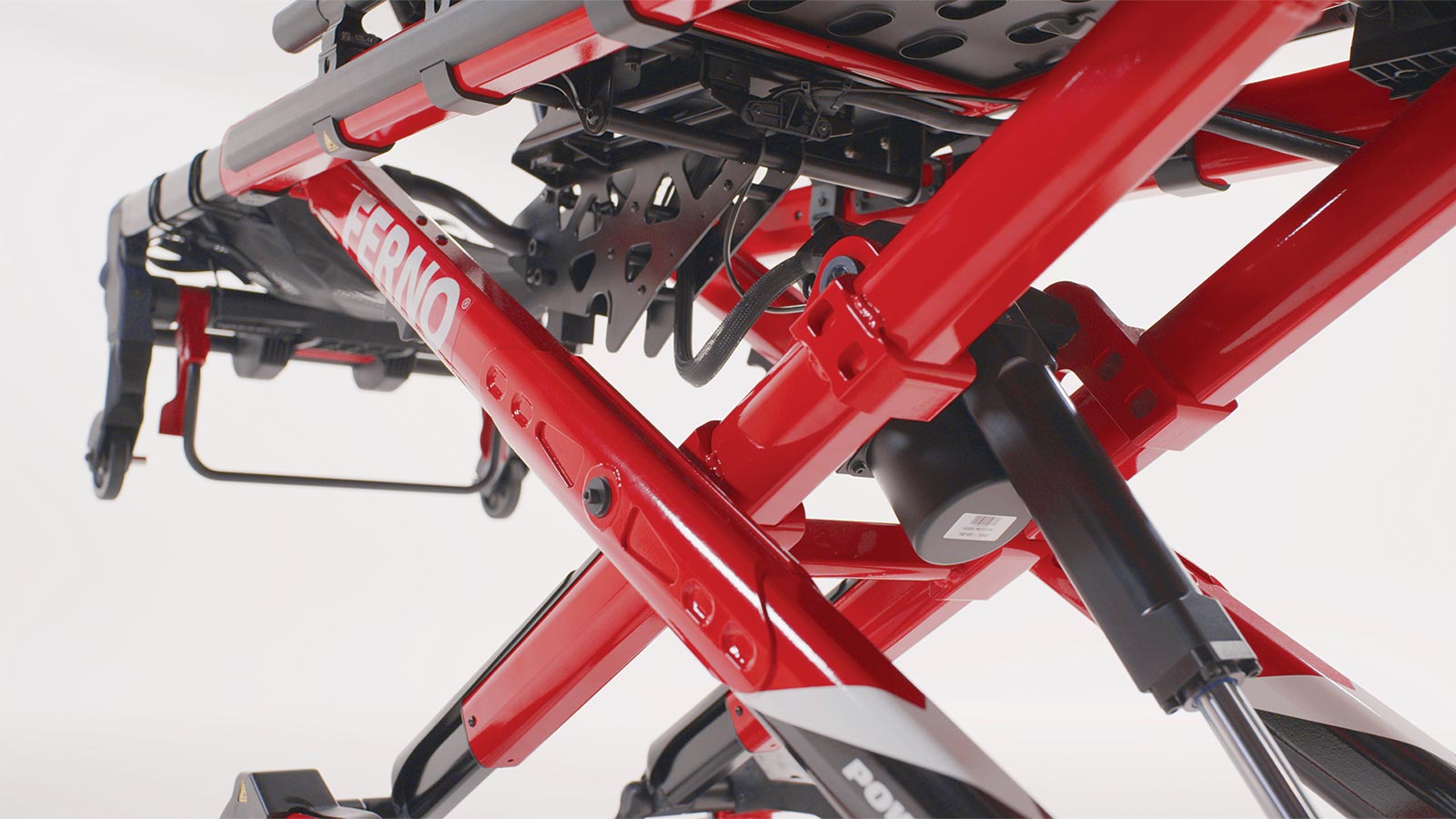 Close-up view of the hose-free actuator located beneath the Ferno Power X2 cot