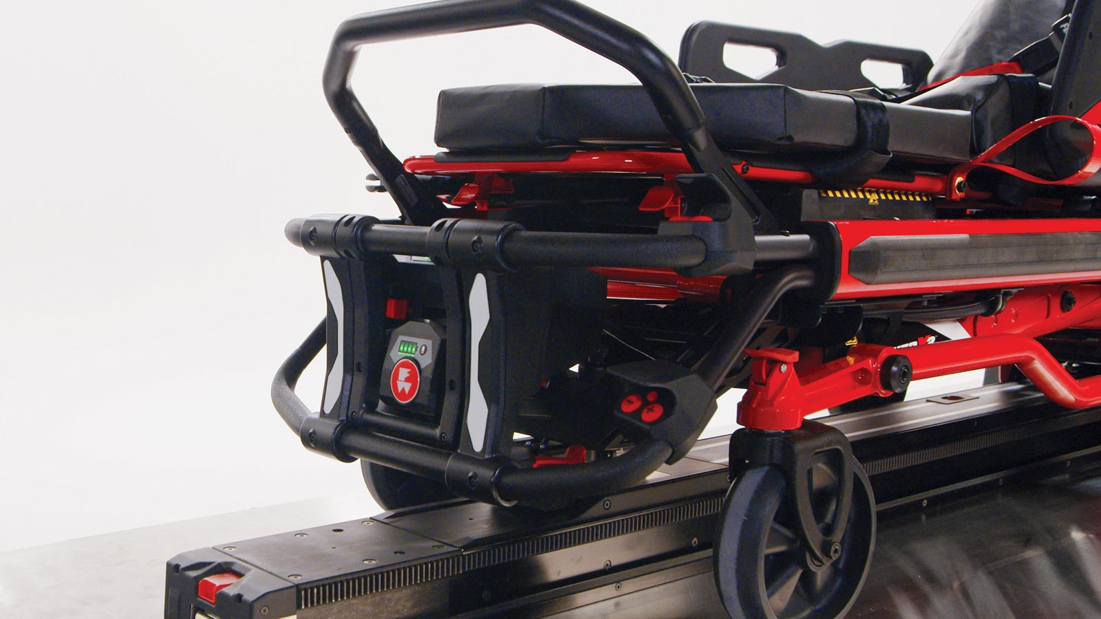 Close-up of the Ferno Power X2 connected to the Ferno Power F2 loading system with power drive