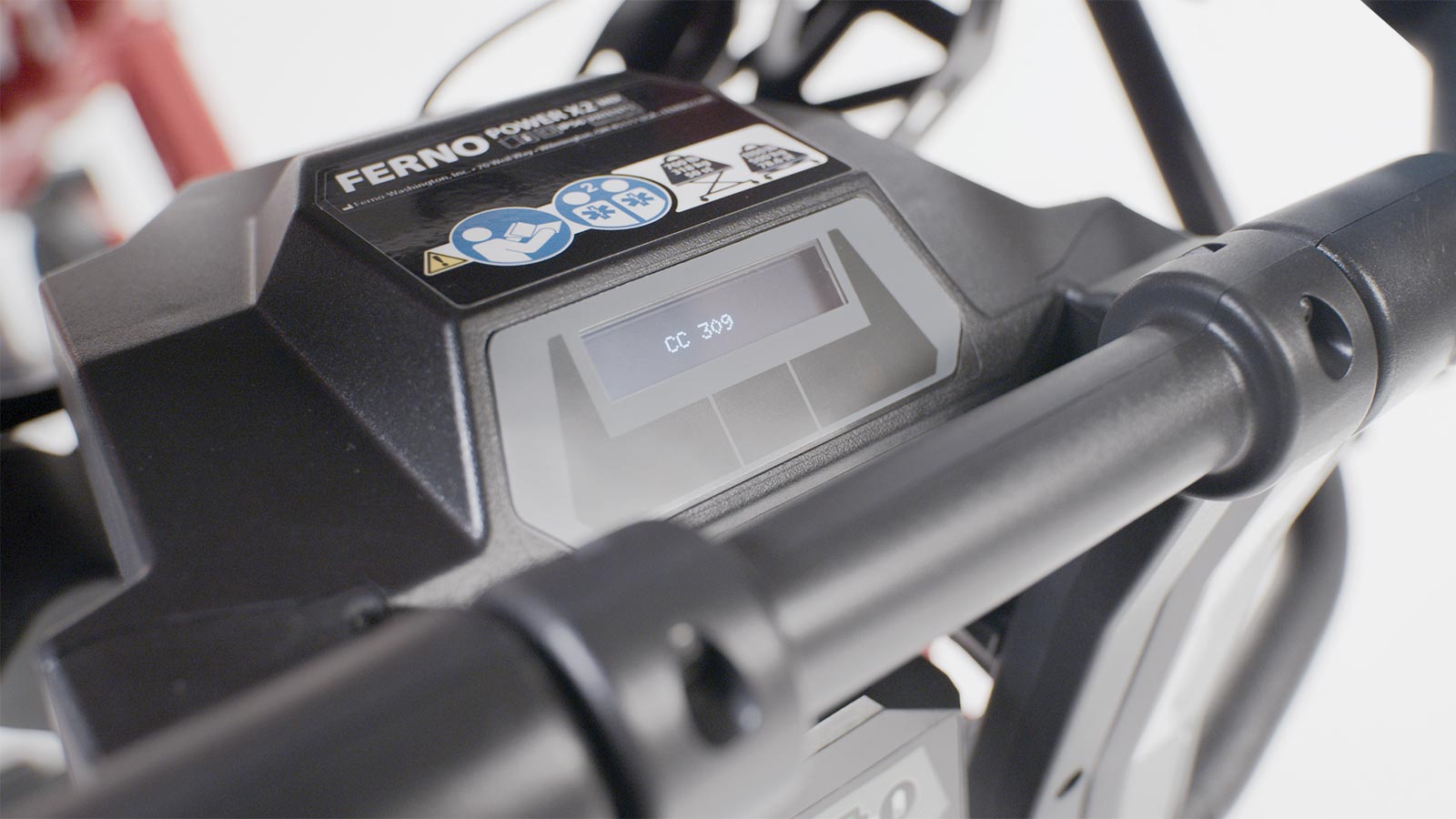 Close-up of the LCD screen displaying the cot cycle count on the Ferno Power X2 handle
